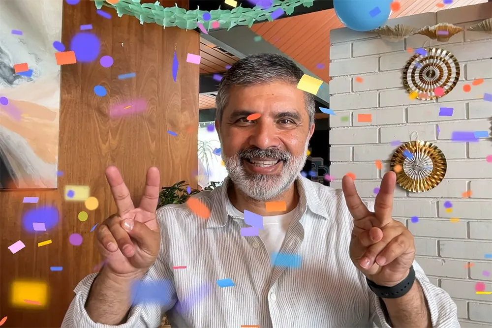 macos sonoma video gesture confetti two peace signs